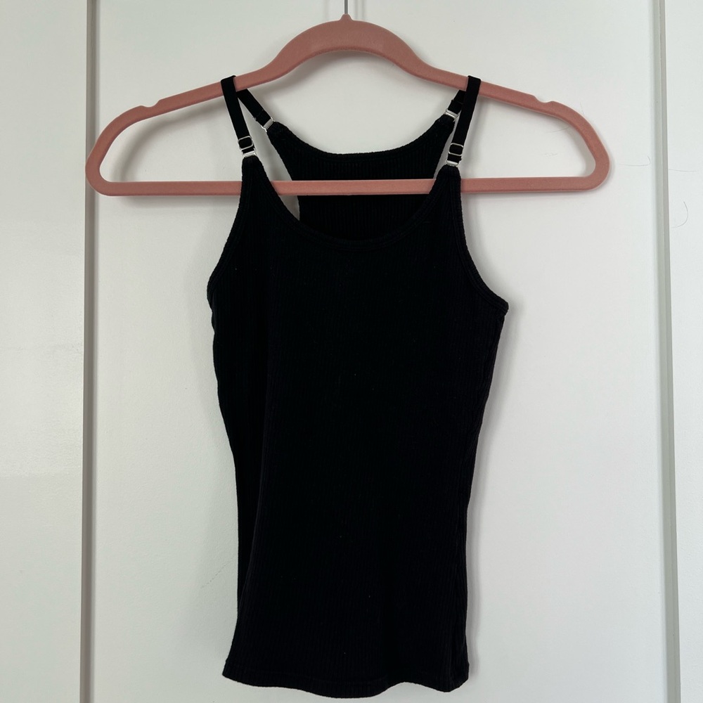 On Gossamer black tank with adjustable straps. Great basic. Worn three times.